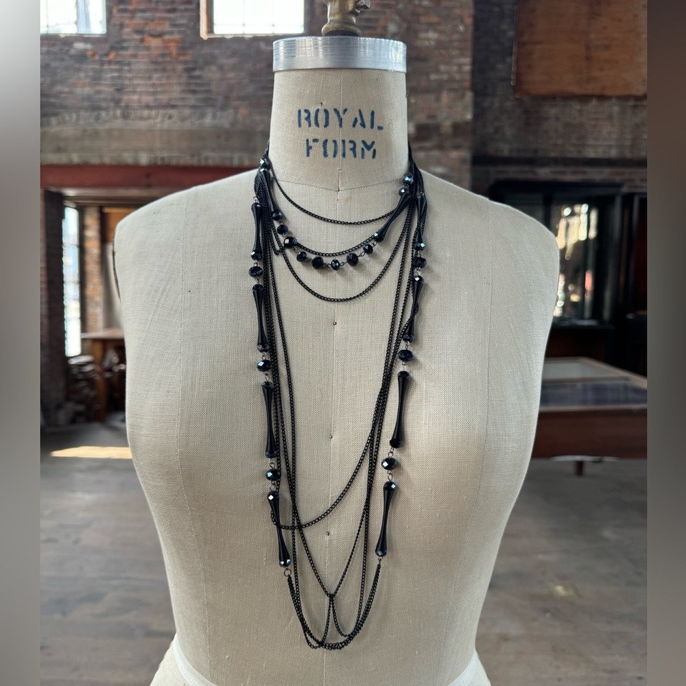 2 jet and metal necklaces